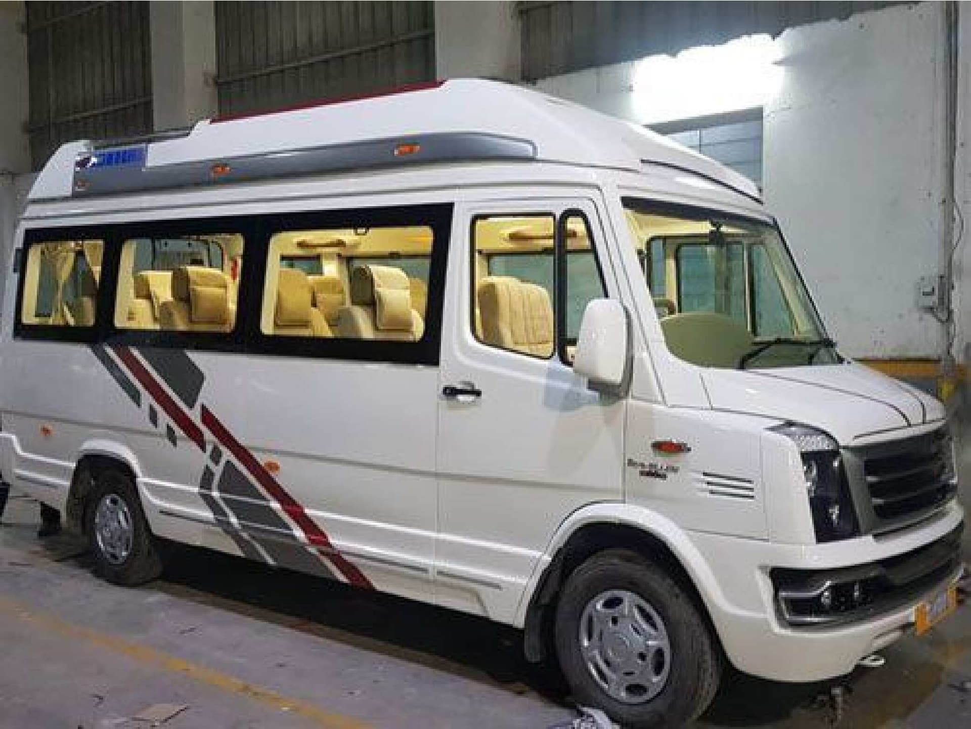 9 Seater Tempo Traveller